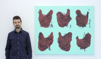 Tom next to pictures of Chickens