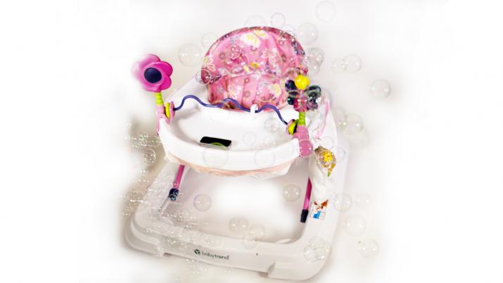A baby's chair with bubbles around it.