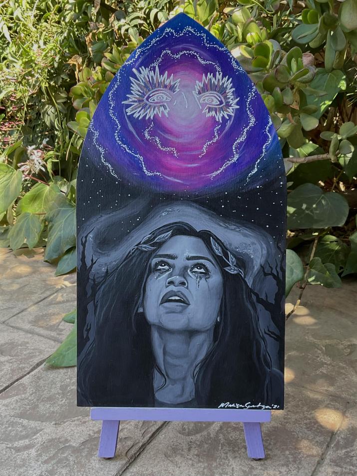 Acrylic painting of a women looking up on a wood panel