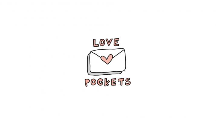 A cute little cartoon envelope with a light pink heart sealing it and the word "love" on the top and "pockets" on the bottom.